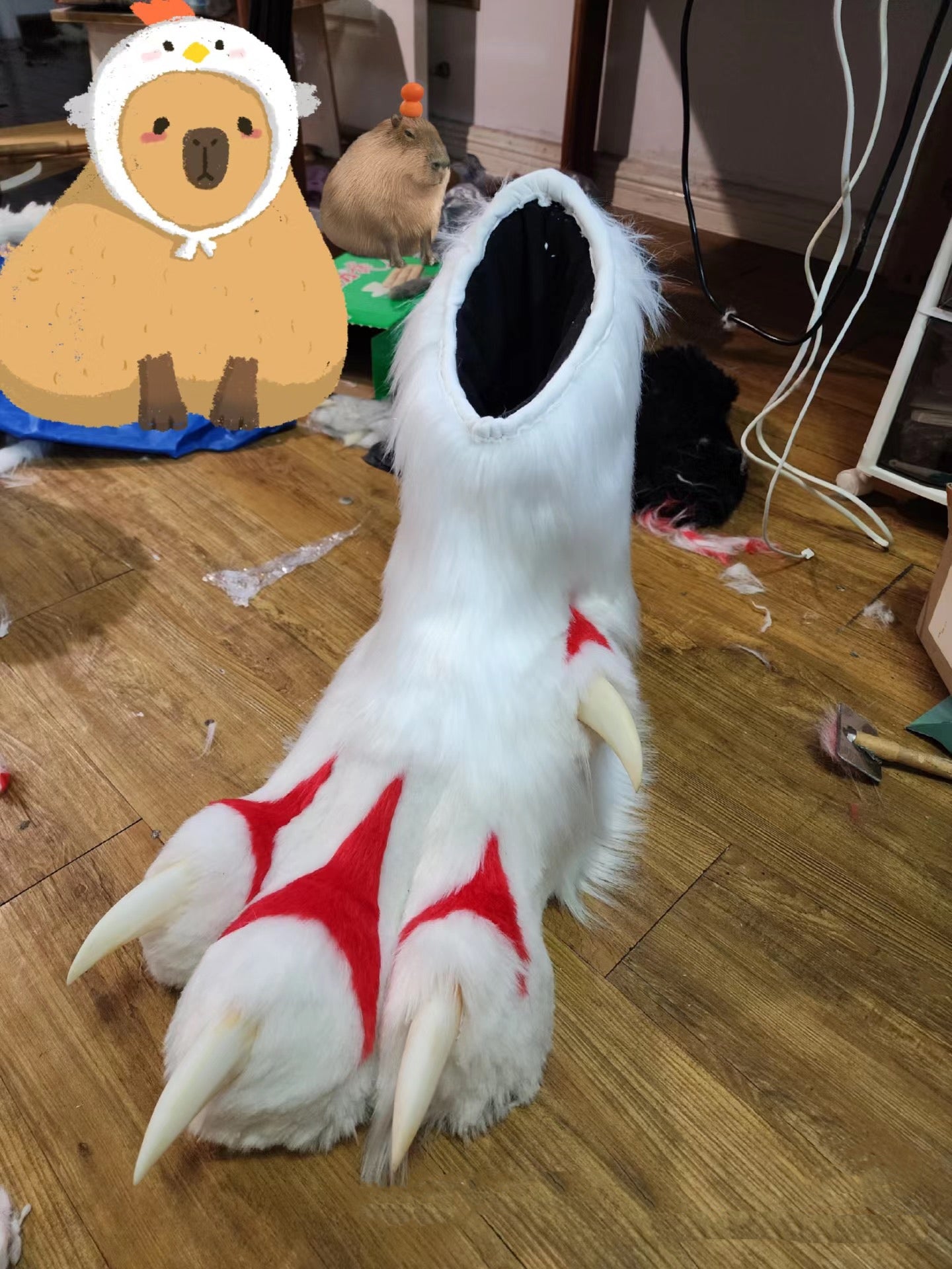 Paw feet made of red and white faux fur patchwork for a fursuit; color customization available.