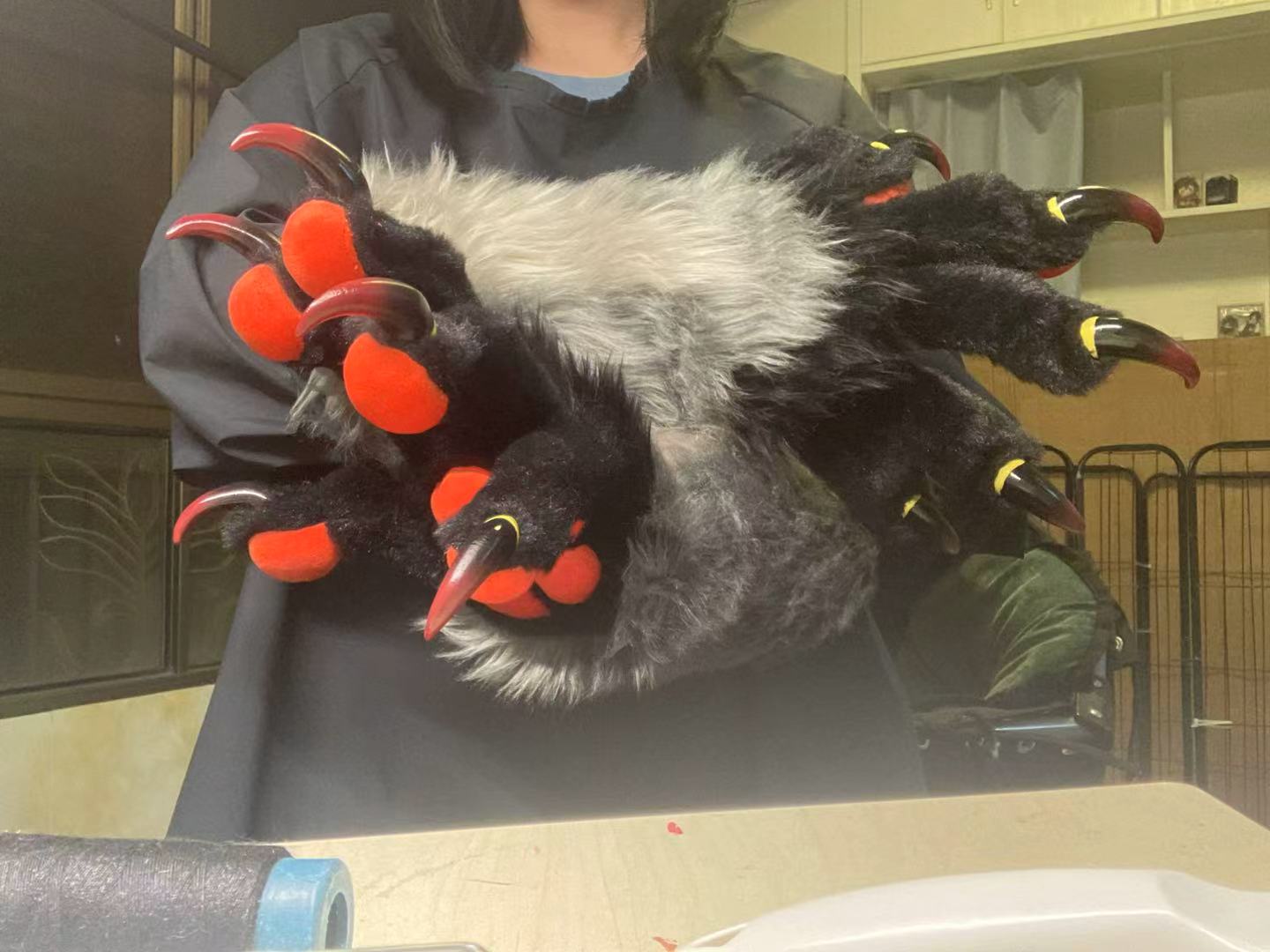 Three-tone red, black, and gray paneling big paws furry fursuit custom