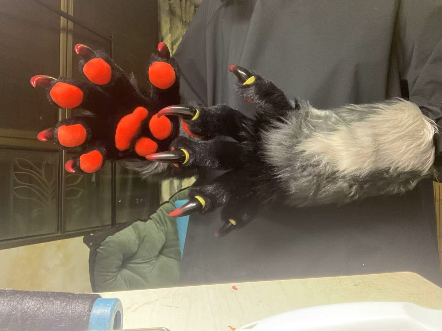 Three-tone red, black, and gray paneling big paws furry fursuit custom