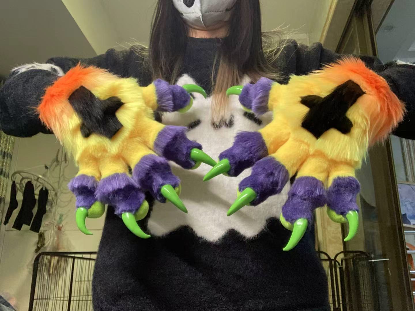 Purple, yellow, orange, and green color-blocked big claw; green 3D-printed nails furry fursuit