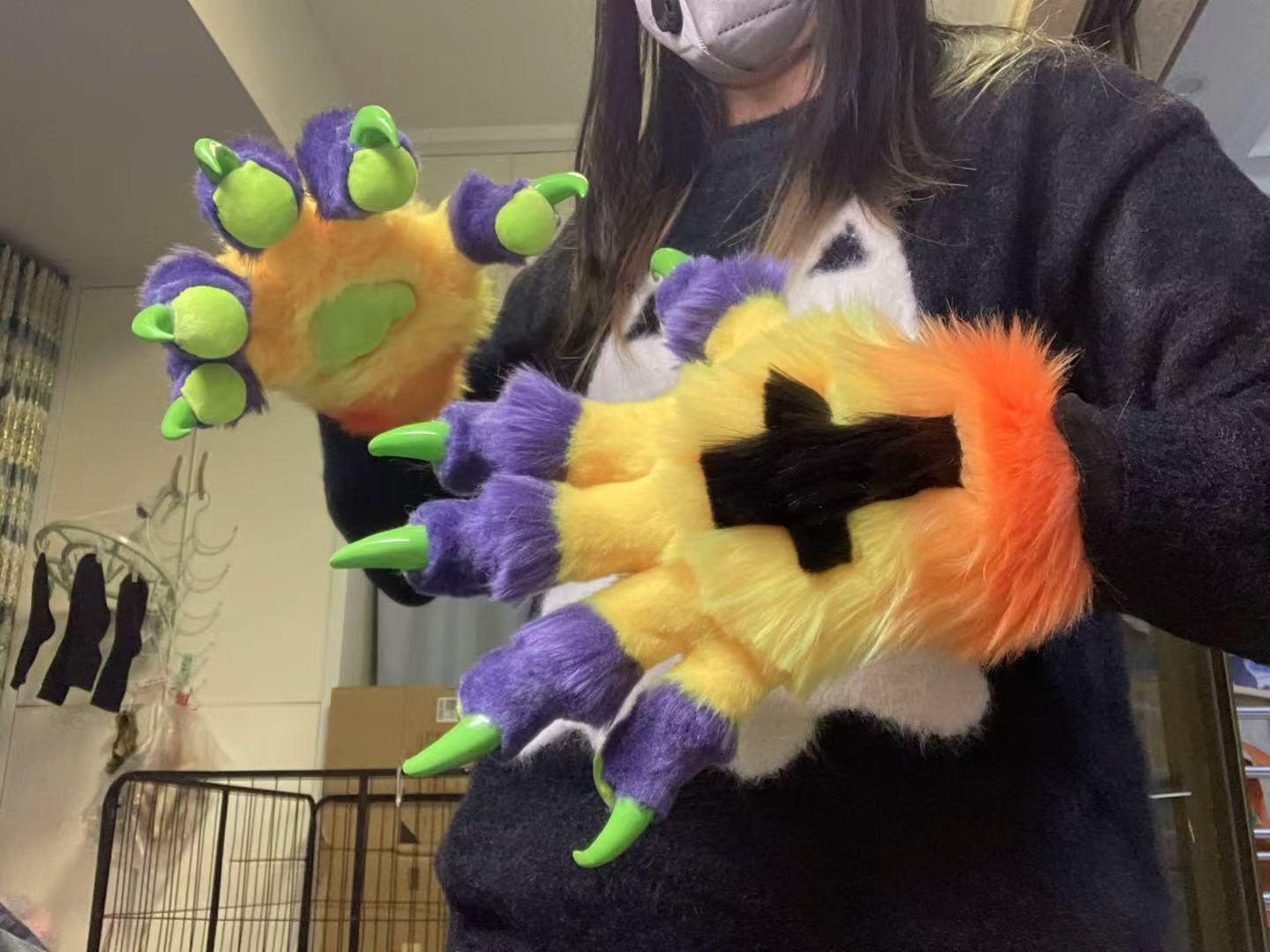 Purple, yellow, orange, and green color-blocked big claw; green 3D-printed nails furry fursuit