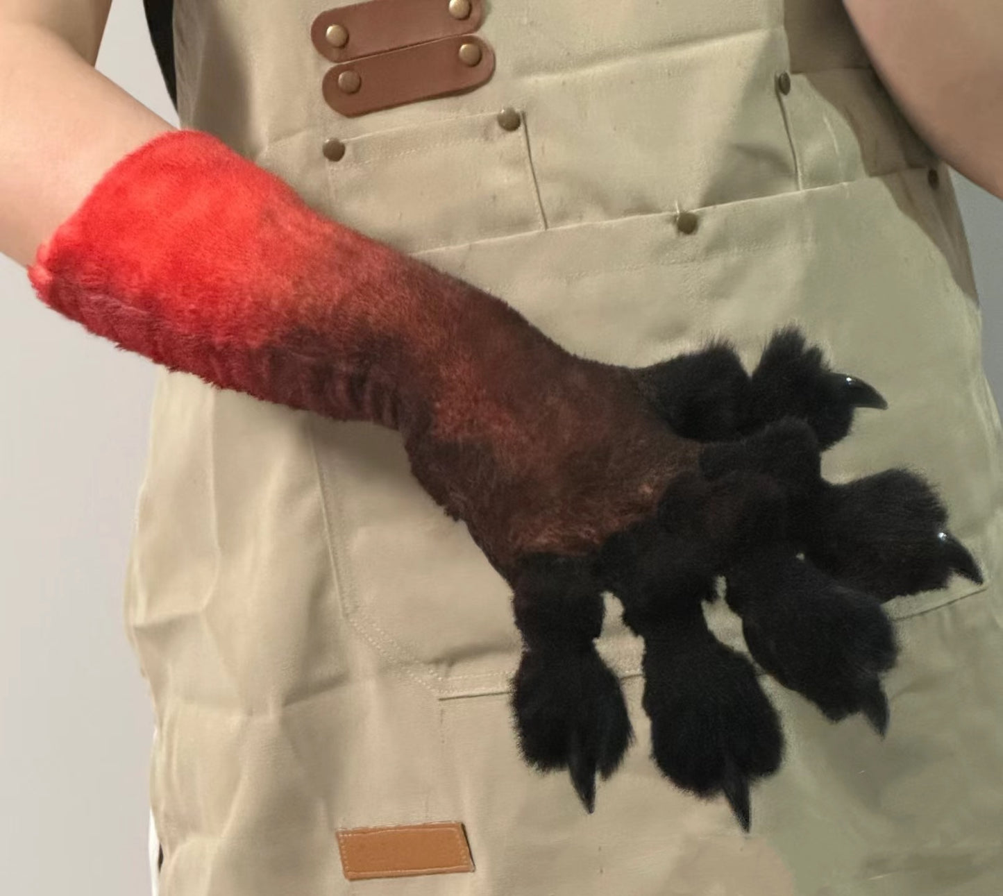 Black-to-red gradient faux fur fabric paws; black claws; black paw pads.