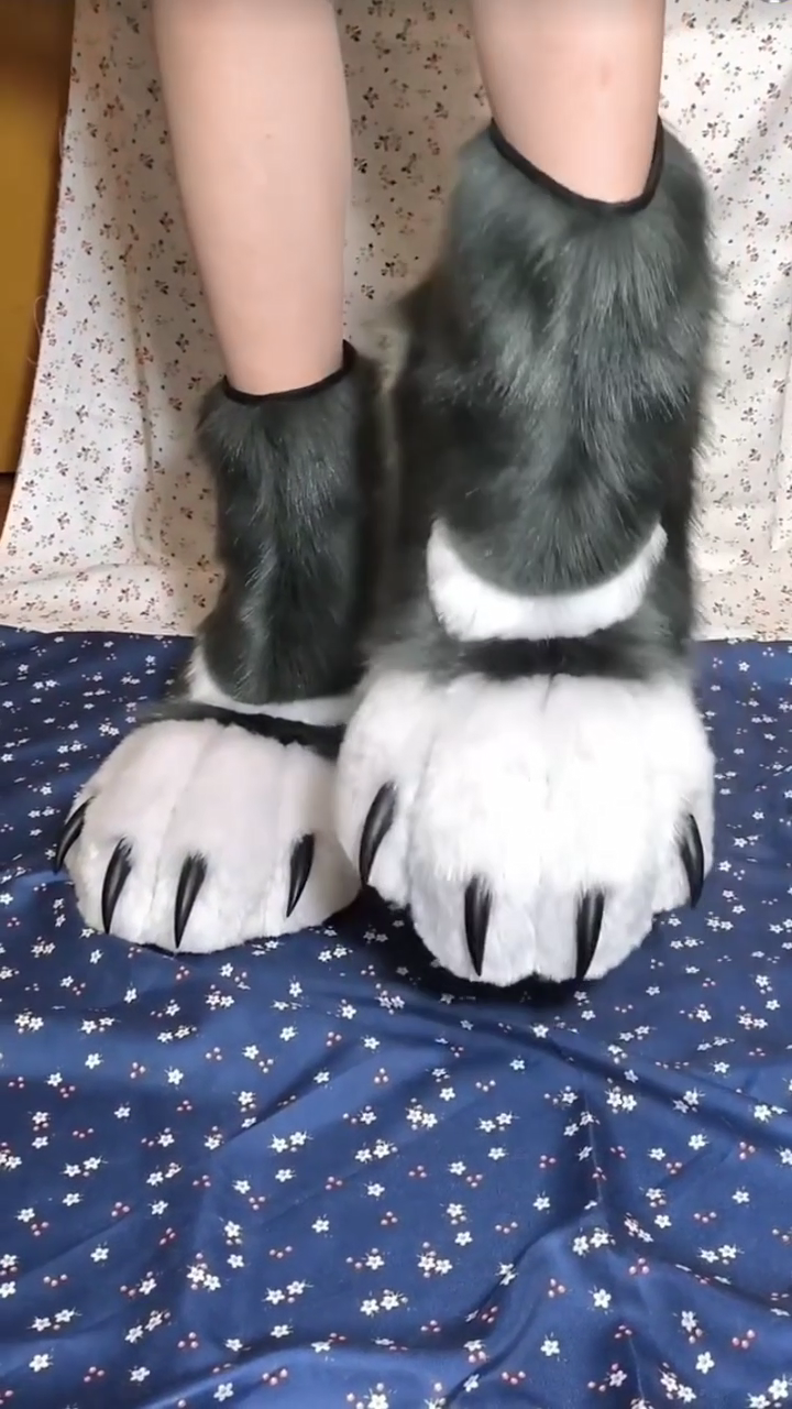 Black and white faux fur patchwork paw feet for a fursuit, with colors customizable.