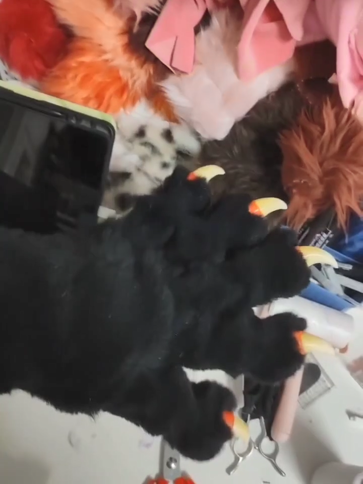 Black realistic paws  furry fursuit