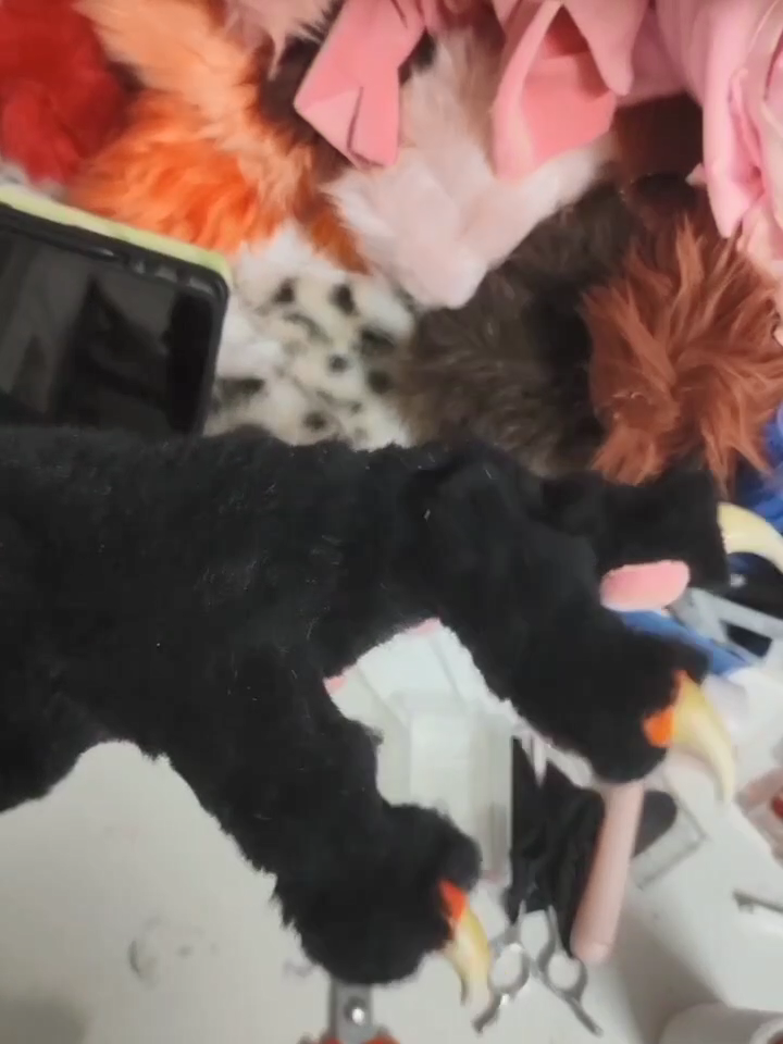 Black realistic paws  furry fursuit